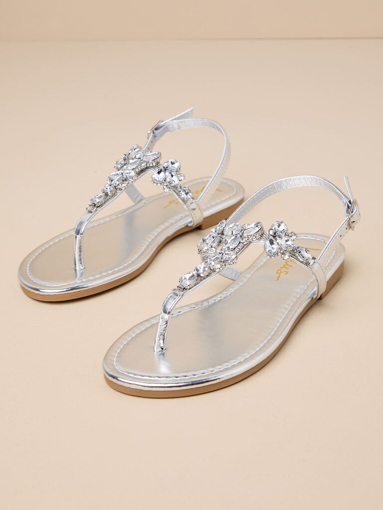 Silver flat sandals with front diamond embellishments