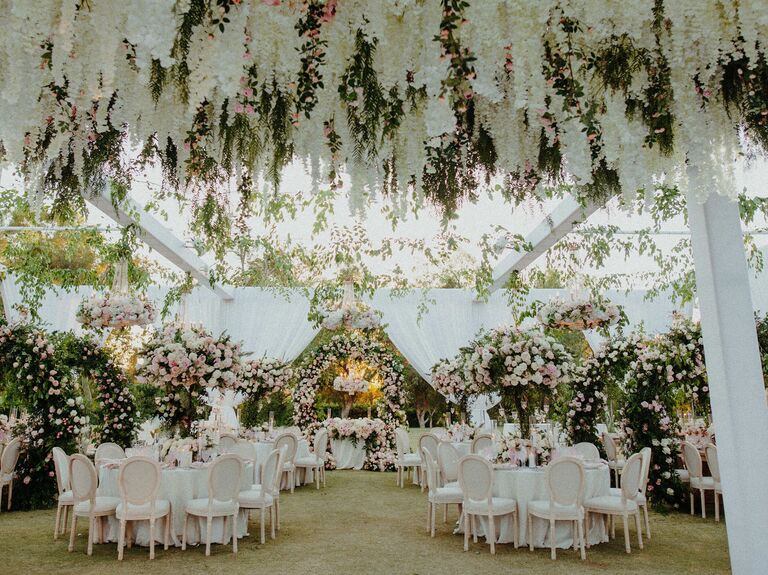 White hanging flowers at wedding reception