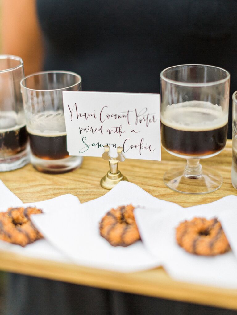 A tray of cookies and small glasses of porter to pair. 