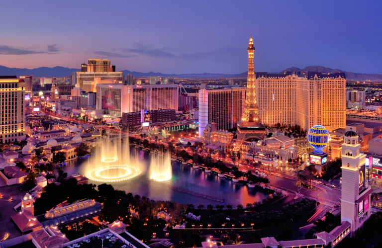 City skyline at night with Bellagio Hotel water fountains in Las Vegas, Nevada