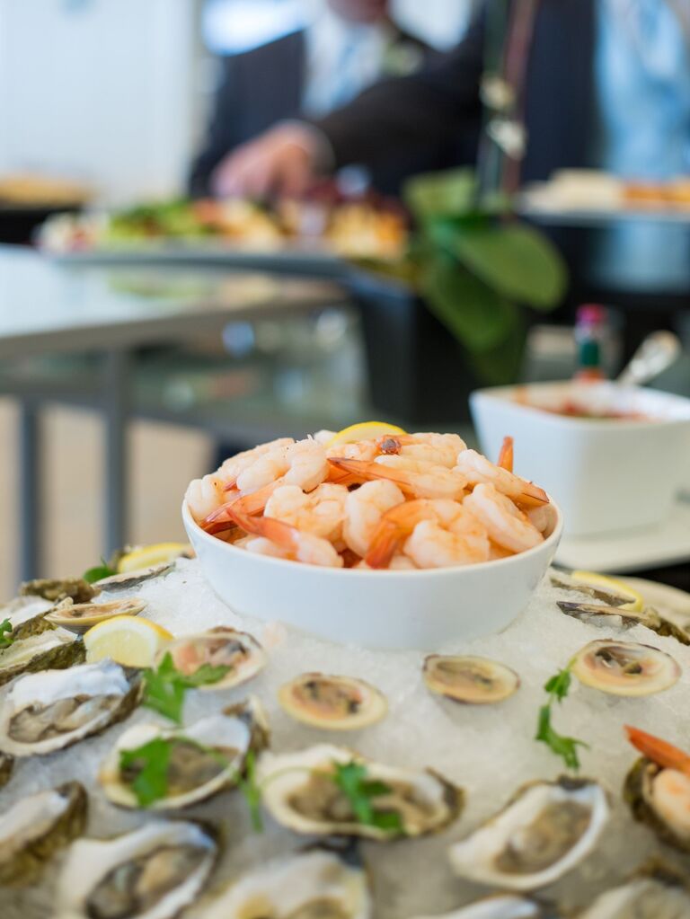 Raw seafood bar for a summery wedding reception food option