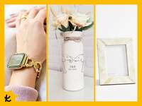 14 year anniversary gifts: gold smart watch band, elephant vase, ivory tiled photo frame