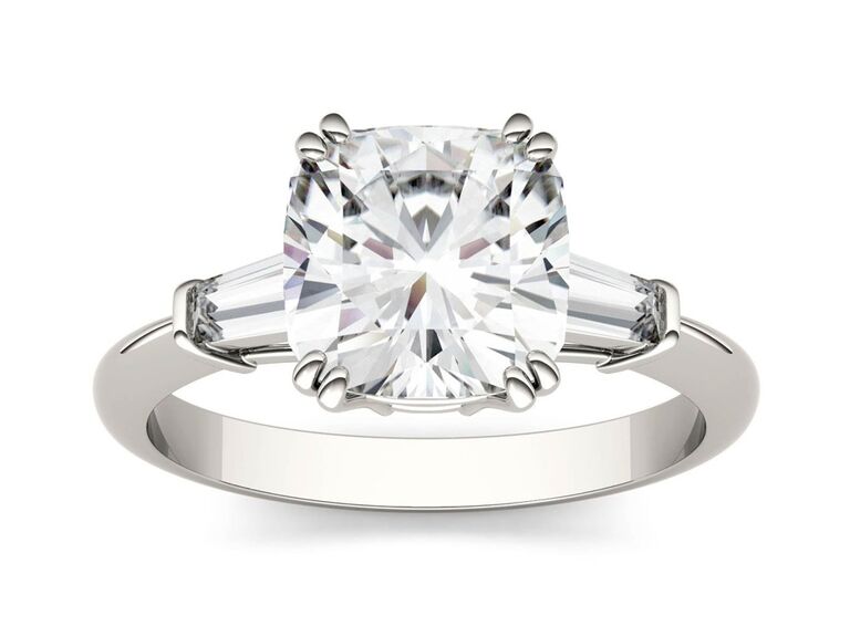 charles and colvard three stone engagement ring with cushion cut diamond and two rectangular shaped diamonds and plain white gold band