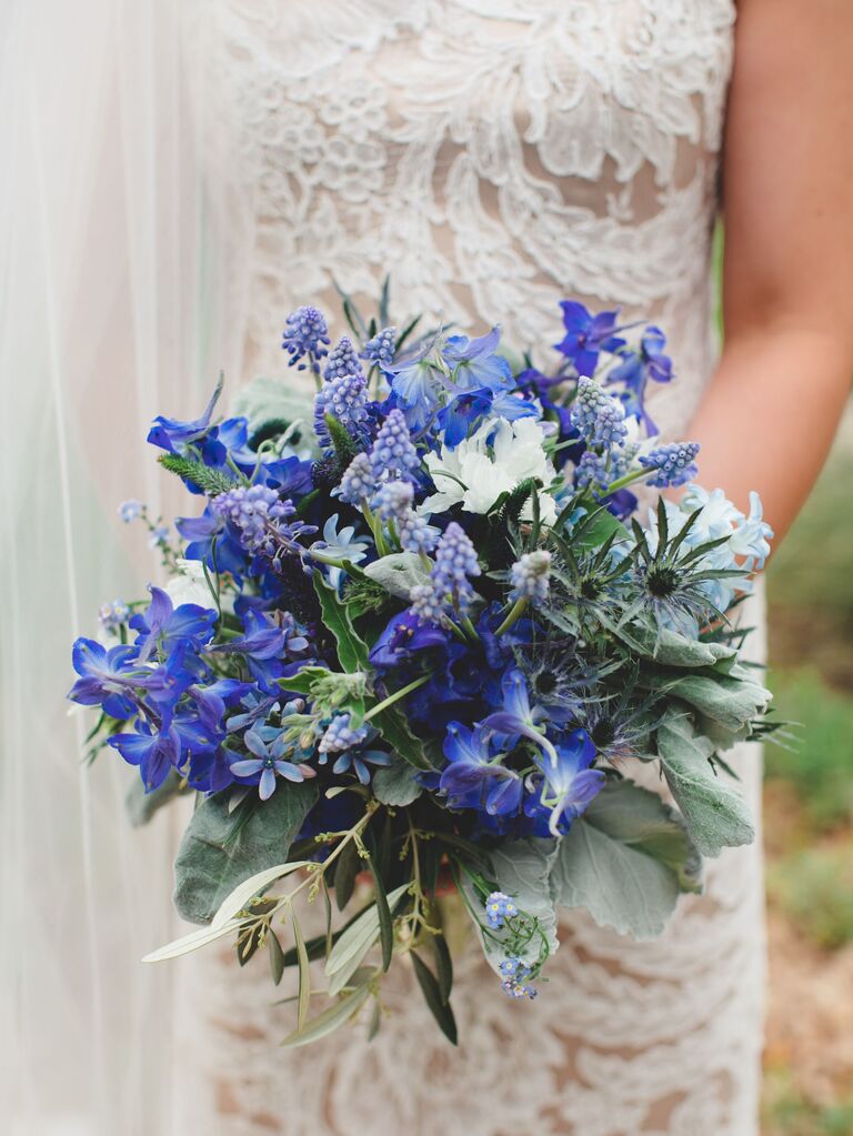 dark blue wedding bouquet with muscari, delphinium, forget me nots and thistle
