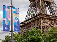 Paris Olympic Captions & Hashtags - Eiffel Tower with Olympic Rings