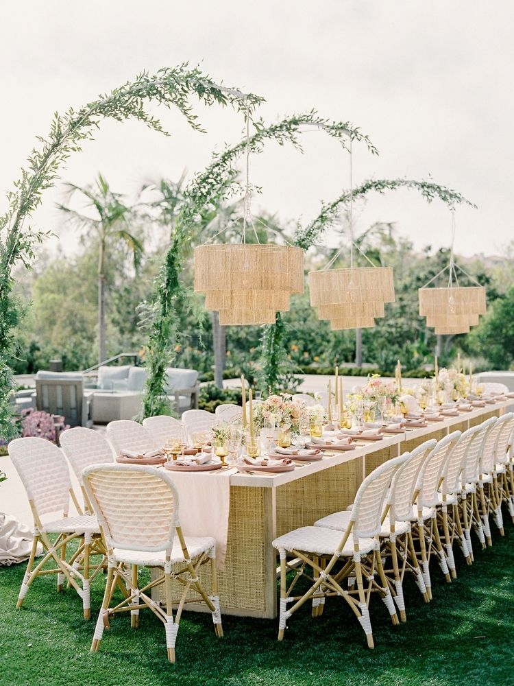 Boho outdoor wedding with wicker chandeliers