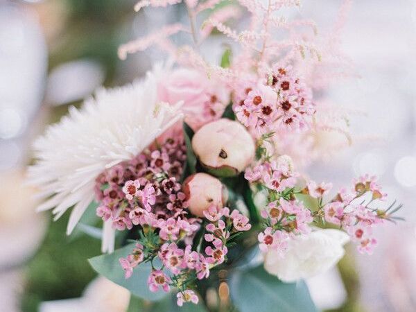 centerpiece with pink wax flowers