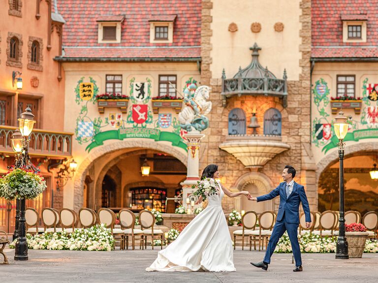 Couple walking through EPCOT's Germany Pavilion at Walt Disney World Resort in Orlando, Florida