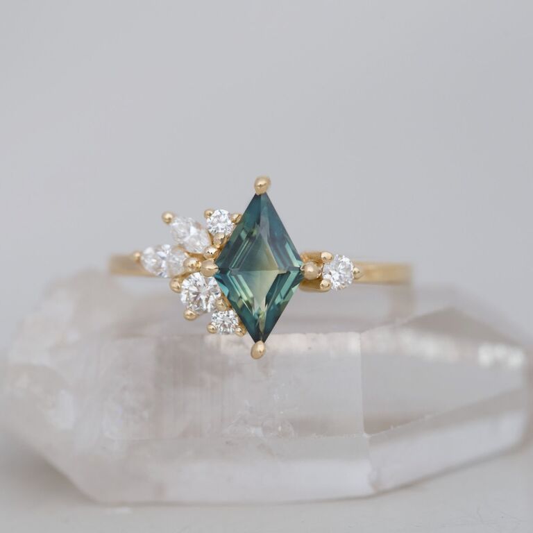 Unique teal sapphire engagement ring by Mineralogy