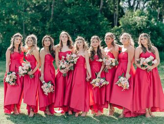 Bridesmaids wearing strapless dresses