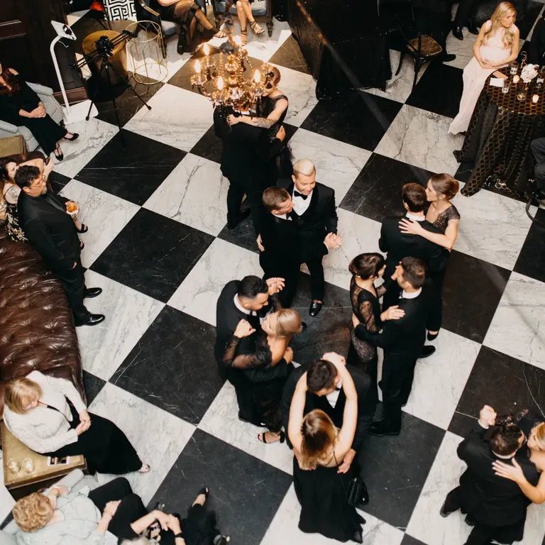 Black and white checkered dance floor for Great Gatsby themed wedding
