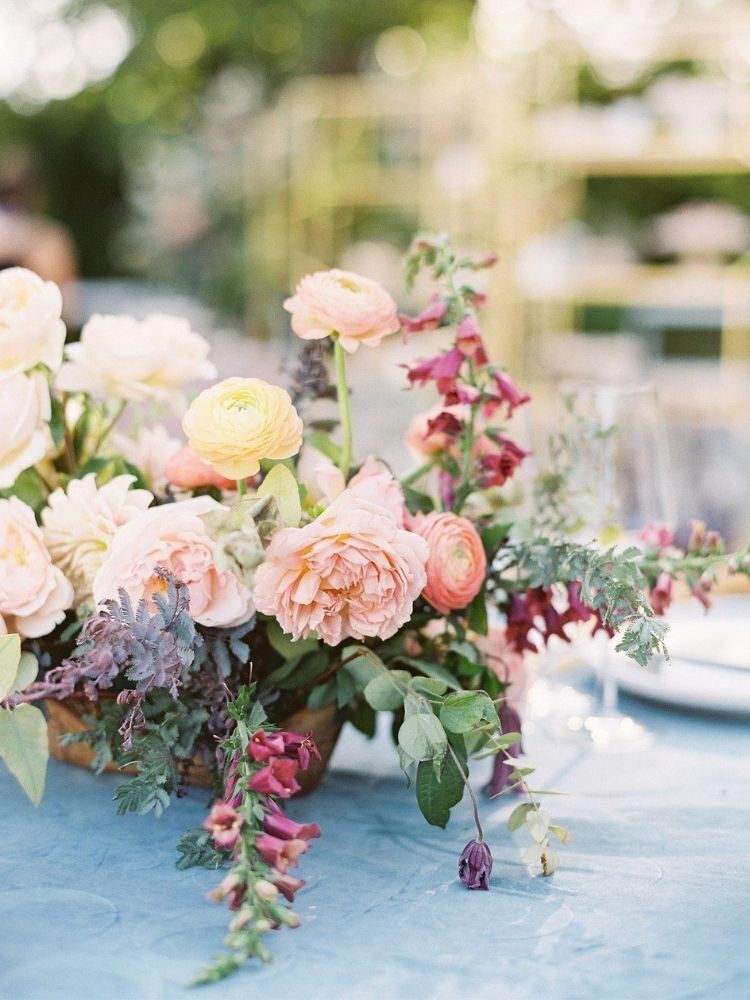 Spring flower arrangement with ranunculus and foxglove