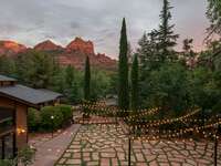 L'Auberge de Sedona skyline and garden terrace event venue string lights and red rock formations backdrop