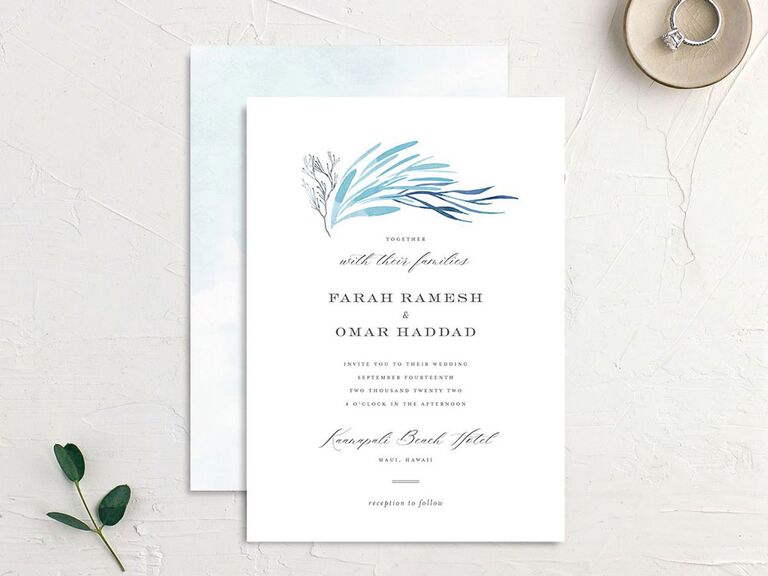 Elegant white beach wedding invitation with blue coral motif
